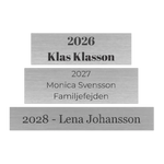 Skyltar till vandringsprispokal silver med svart text