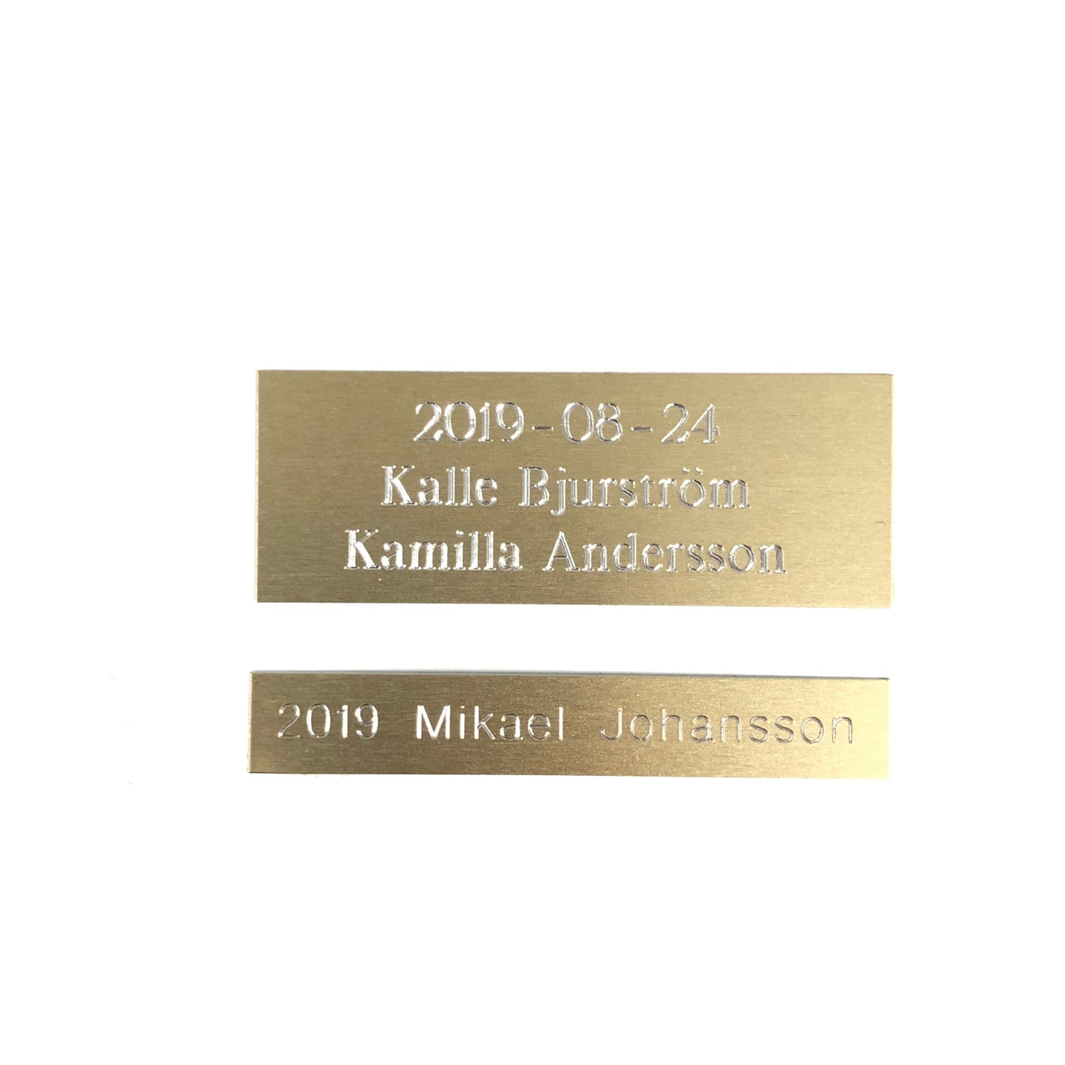 Skylt till vandringspris borstad guld