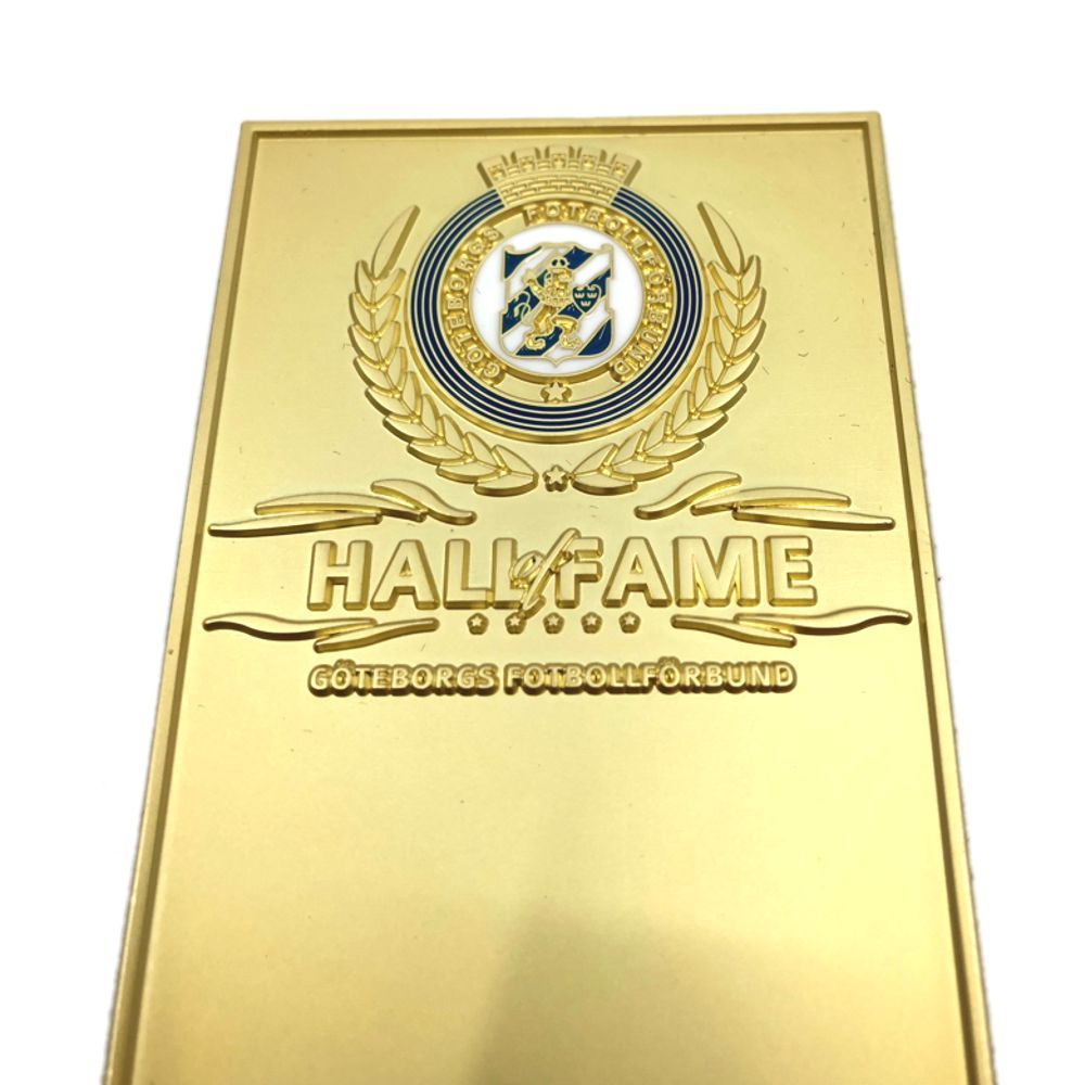 Specialtillverkad plakett i metall med blank finish